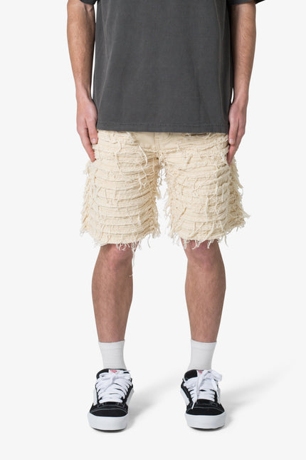 Pantalones cortos vaqueros deshilachados por toda la prenda - Caqui