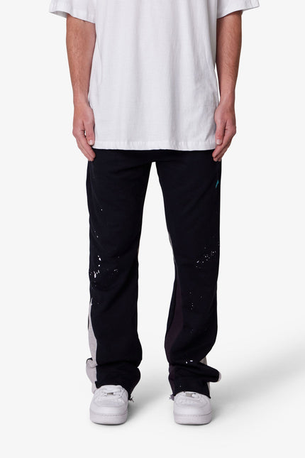 Pantalones deportivos de corte bota con contraste - Negro