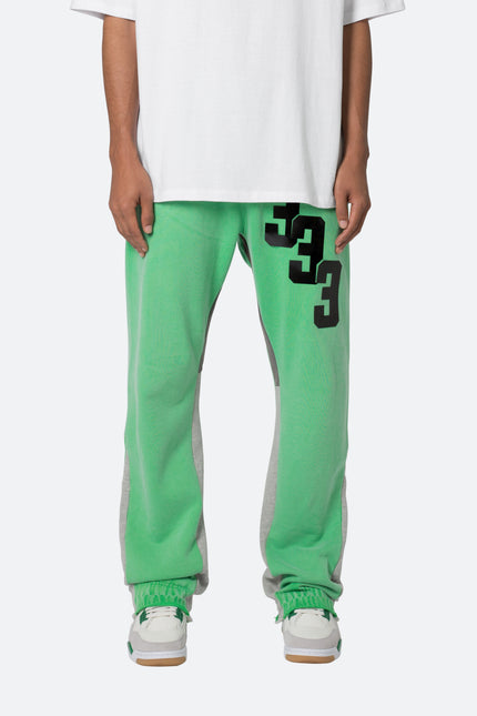 Pantalones deportivos de corte bota con parches y contraste - Verde
