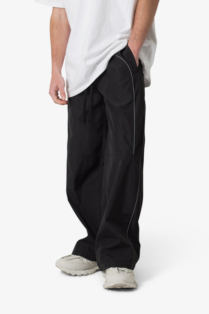 Pantalones deportivos holgados con ribete - Negro