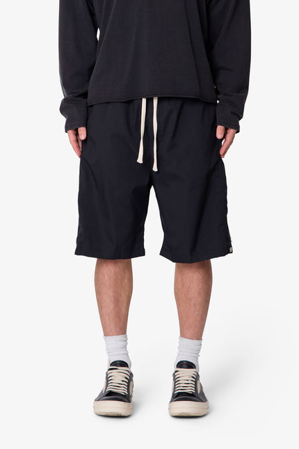 Pantalones cortos de nailon con cierre lateral - Negro