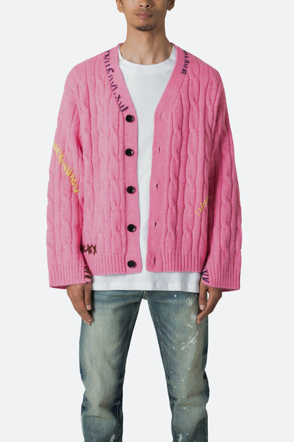 Gilet en maille torsadée rose