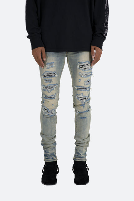 X165 Vaqueros ajustados con estampado paisley - Azul/Negro